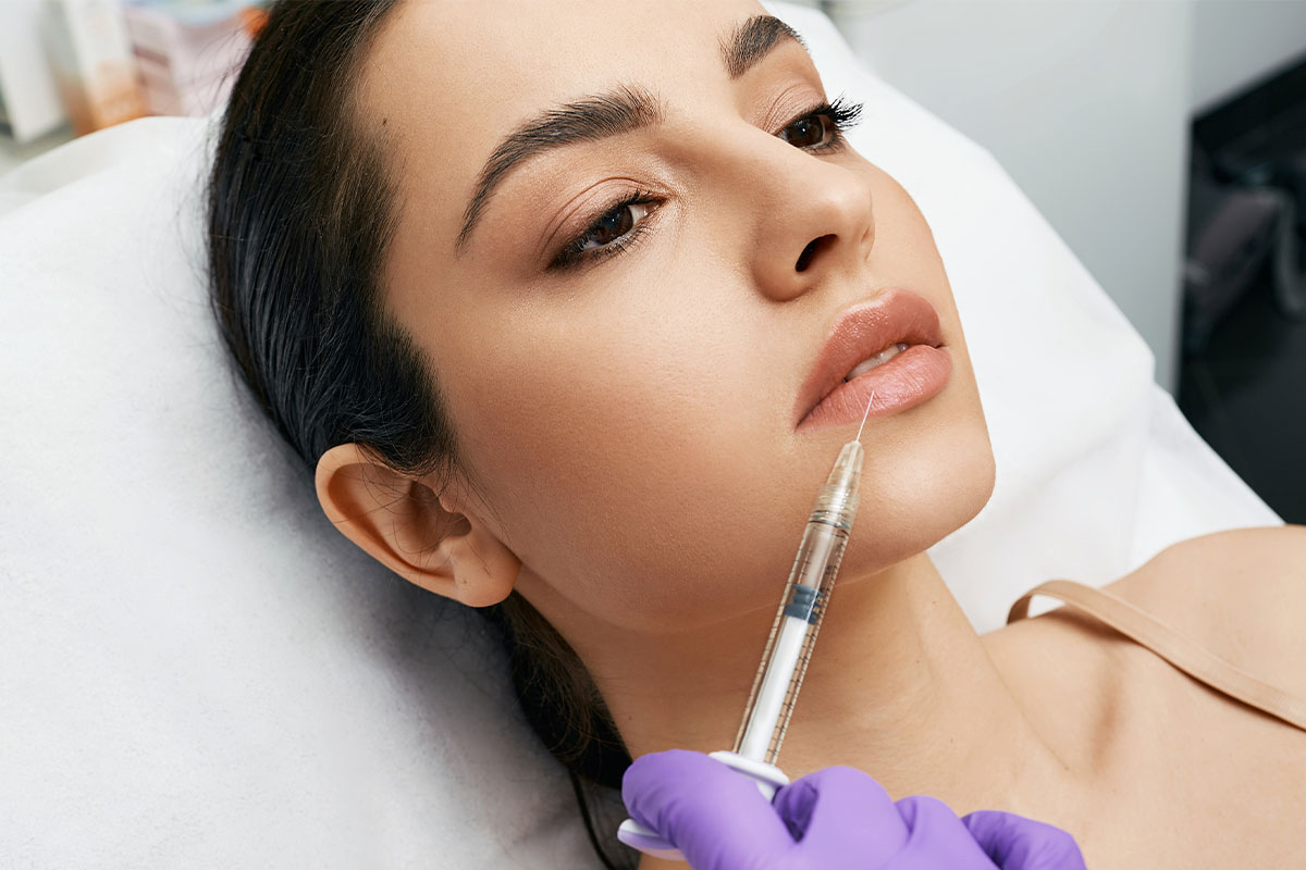 woman during treatment for dermal fillers in Brea